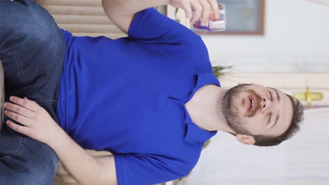 Vertical-video-of-Man-drinking-water-for-healthy-life.